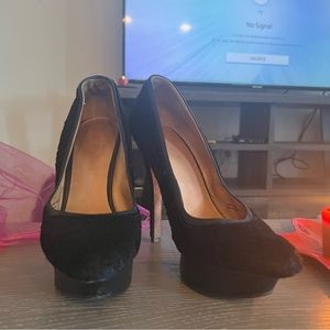 Authentic L.A.M.B leather cow fur.